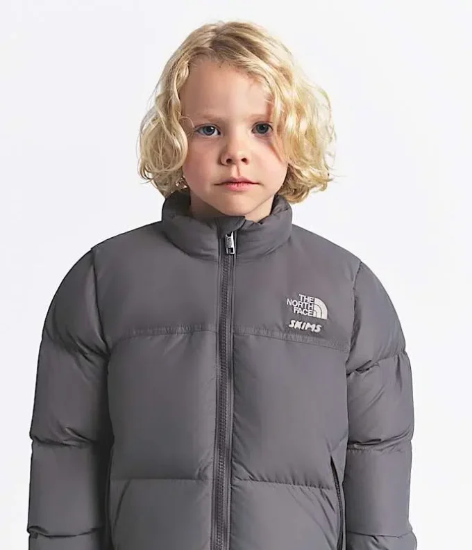 The North Face X SKIMS Kids’ 1996 Nuptse Jacket The North Face X SKIMS Kids’ 1996 Nuptse Jacket